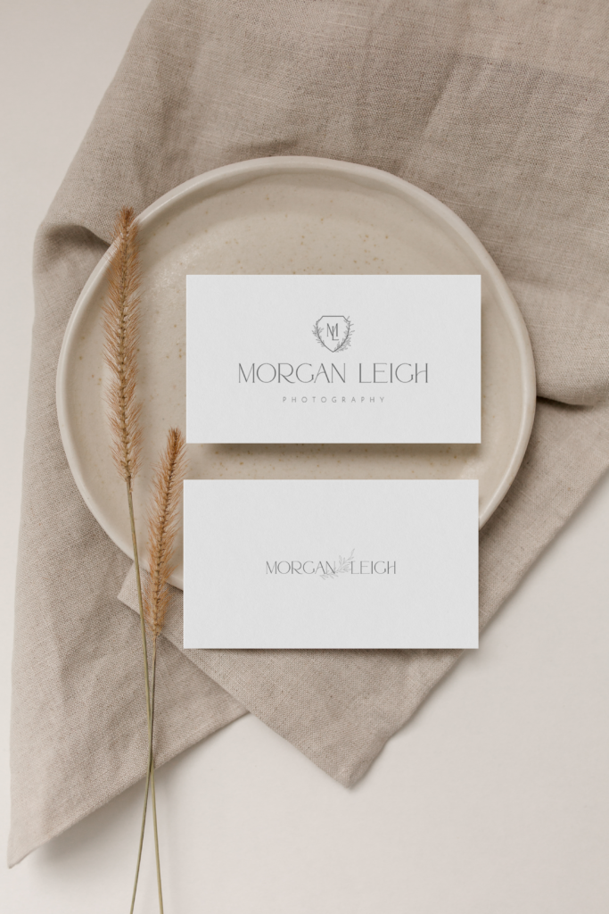 A modern and sophisticated logo created for a photographer, including a crest and monogram, and made from a pre-made branding kit for photographers.