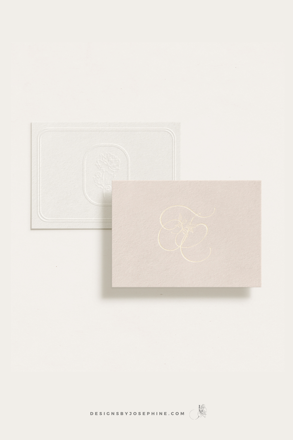 Business card with embossed effect with the custom brand in blush and gold colors with peonies and script letters created for wedding photographer Tori Claire